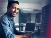 IT professional working on a PC.