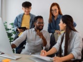 A team at work in office setting.
